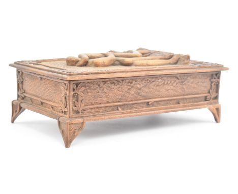 An early 20th century French wooden trinket / jewellery box depicting The Kiss by Auguste Rodin to lid. The box featuring han