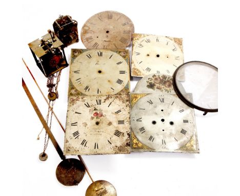 AN ANTIQUE BRASS BIRD CAGE 30 HOUR CLOCK MOVEMENT together with a further 30 hour longcase clock movement with painted dial s