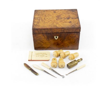 A LATE 18TH / EARLY 19TH CENTURY ELM TEA CADDY with quarter top and mother of pearl shield scape shaped escutcheon 16cm wide 