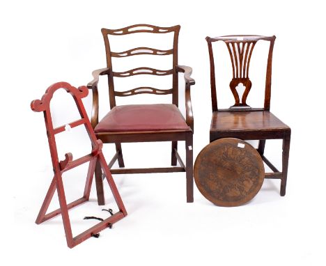 A GEORGIAN MAHOGANY ELBOW CHAIRwith pierced ladder back and drop in seat, a circular pokerwork panel, a red painted Oriental 