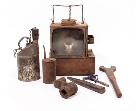 A GREAT WESTERN RAILWAY TIN AND COPPER LANTERN stamped 'GWR Reading', 18cm wide together with a small oil can, stamped 'GWR',