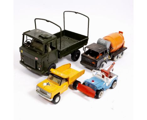 A TONKA TOY TIN DUMP TRUCK 34cm long together with a Tonka wrecker truck, a Louis Marx &amp; Co., cement mixer and an Action 