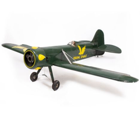 A GREEN PAINTED SCALE FLYING MODEL OF A SINGLE WINGED AEROPLANE 'Regal Eagle', the wing span approximately 210cm wide