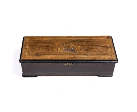 A 19TH CENTURY CONTINENTAL MUSICAL BOX  with painted decoration to the case, playing twelve airs, the comb with one tooth mis