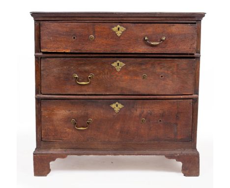 AN 17TH CENTURY OAK CHEST of three long drawers raised on bracket feet 94cm wide x 57cm deep x 91cm high