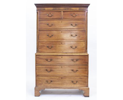 A 19TH CENTURY MAHOGANY CHEST ON CHEST with two short and six long drawers with brass swan neck handles and raised on bracket