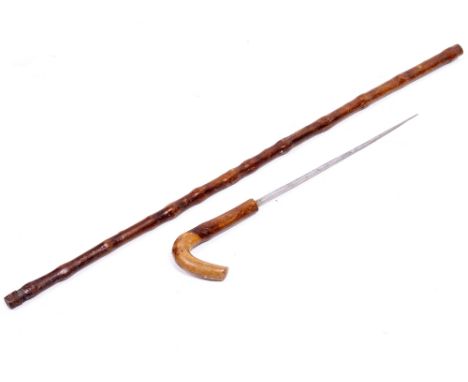 AN ANTIQUE SWORDSTICK the stick 89cm long, the blade 30cm long 