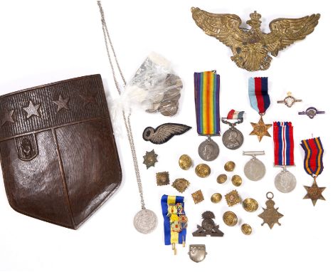 A GROUP OF WORLD WAR I AND WORLD WAR II RELATED MEDALS buttons and badges to include a 1939-45 war medal, a Burma Star and a 