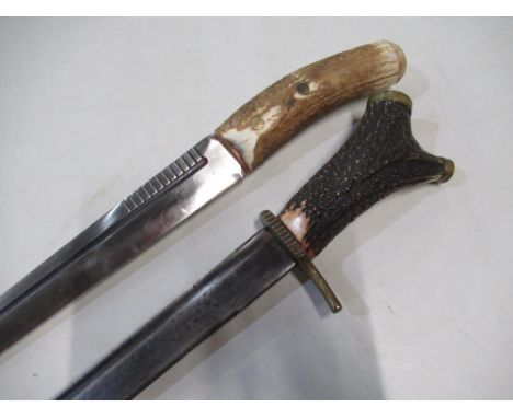 Two converted hunting type daggers, one with 13" Japanese short sword blade, brass mounts and antler grip, the other with 15 