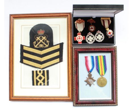 WWI medal pair for 84438 Dvr. W Leighton RFA (mounted in frame) together with Royal Navy CPO cloth bullion badges and slider 