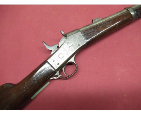 Remington Rolling Block Cavalry Carbine .40cal with ring bar and saddle ring 20 1/2 inch round steel barrel, fastened with si
