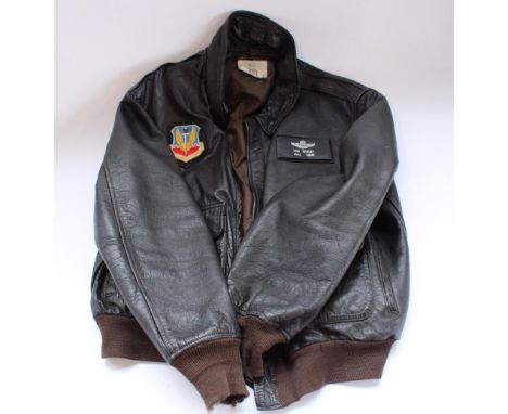 USAF leather flight jacket type A2 with velcro attached rank patch and cloth ACC patch, size 