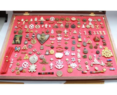 Large selection of British military and some civilian cap badges, enamel sweetheart badges, pips, medallions etc.   Dates ran