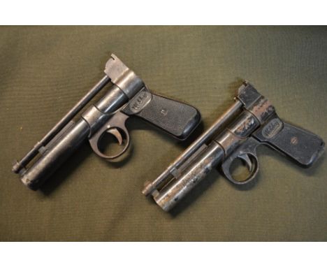 2 vintage Webley Junior .177 (4.5mm) over lever action air pistols, neither hold compression. One with damaged grips. 