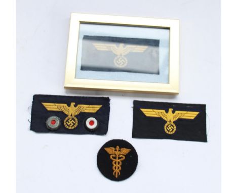 Three WWII period German Third Reich breast eagles together with a medical Caduceus cloth patch 