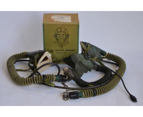 3 vintage oxygen masks from the 1950s. An R A Hawks/MSA RAF issue Type A-13 mask with hose, end connector and mike line, and 