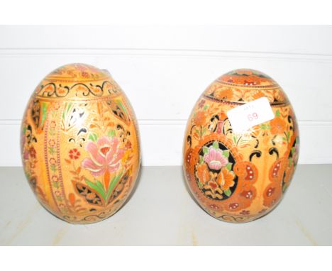 PAIR OF CERAMIC EGGS MODELLED IN CLOISONNE STYLE