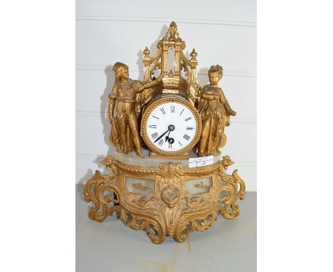 FRENCH STYLE GILT MANTEL CLOCK, THE CYLINDRICAL CLOCK FLANKED BY TWO CHILDREN