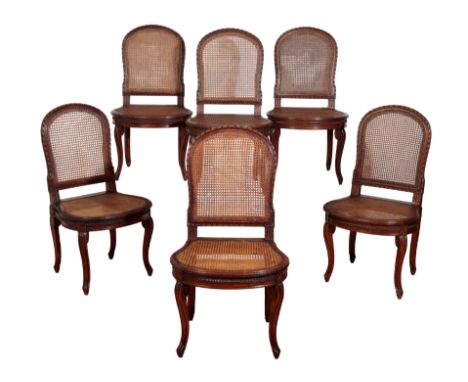 A SET OF EIGHTEEN FRENCH OAK SIDE CHAIRS: eighteen 19th century, two late 20th / early 21st century, each with ribbon-and-sti