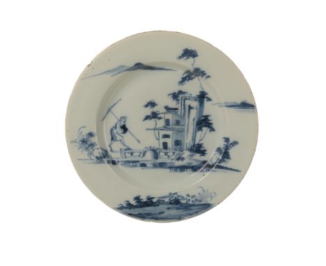 AN ENGLISH DELFTWARE PLATE circa 1745, possibly Liverpool, decorated with an oriental landscape, with a figure walking over a
