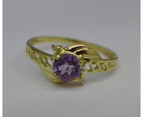 A 9ct gold, amethyst and diamond ring, 0.9g, O