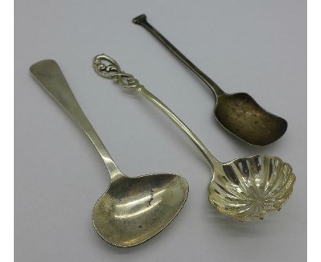 Three silver spoons; sifter, caddy and feeder, 46g