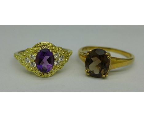 Two silver gilt rings; one smoky quartz and one amethyst, S and R