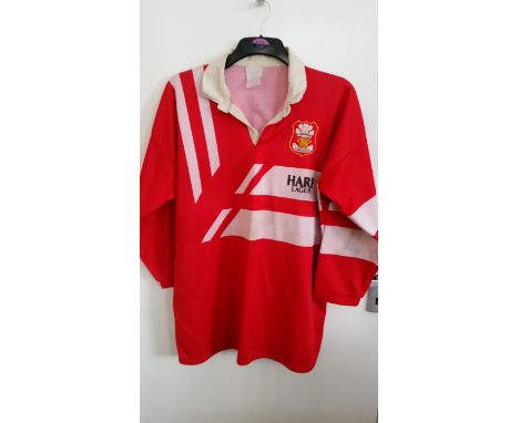 RUGBY, players long-sleeved red shirt from Llanelli RFC, Umbro badge and Harp Lager to chest, believed to have been worn by l