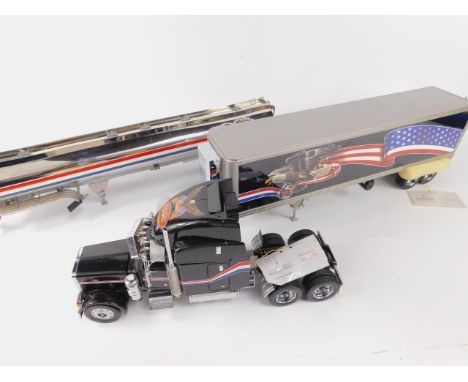 A Franklin Mint die cast model of a Peterbilt Model 379, scale 1:32, together with a Refrigerated Trailer and a Tanker Traile