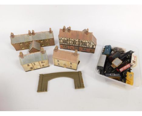 A Grafar n gauge BR diesel shunting engine, seven wagons, track, three houses and a row of shops.