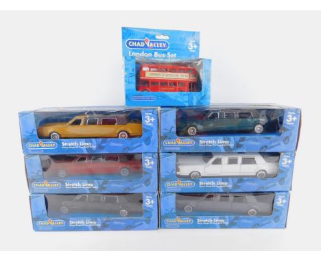 Six Chad Valley die cast models of Stretch Limos, various colour ways, boxed, together with a London Bus Set, boxed, (7).