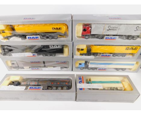 Eight Tekno die cast models of DAF tanker and container lorries, scale !:50, boxed.