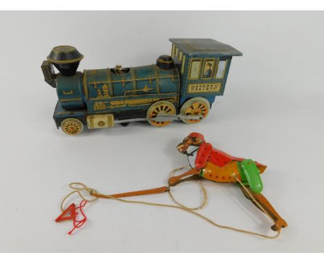 A Japanese tin plate Western Locomotive, by Western Toys, battery operated, Chinese tin plate acrobatic monkey, string operat