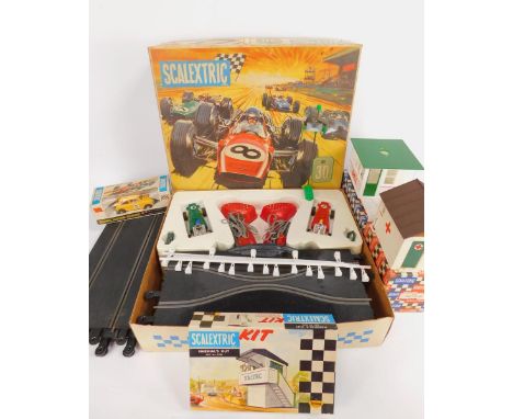 A Scalextric motor racing set, No 30, Rally Mini-Cooper, C7, event brand and hut, A201, first air hut, 9211 and a Marshall's 