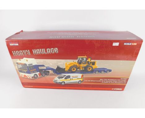 A Corgi Heavy Haulage die cast model of a MAN TGA Low Loader, JCB456 Wheel Loader 2X, and Vauxhall Vivaro Escort Van, R Colle