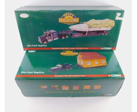 A Corgi die cast replica of a Diamond T989 with Horse Load, Heavy Haulers scale 1:50, limited edition, 4555109, and another o