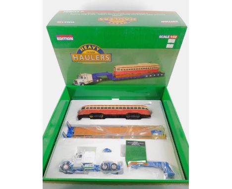 A Corgi die cast model of a Kenworth W925 Hauling PCC Streetcar, on 5-Axle Lowboy, Tyler & Sons Trucking, heavy Hauliers, sca