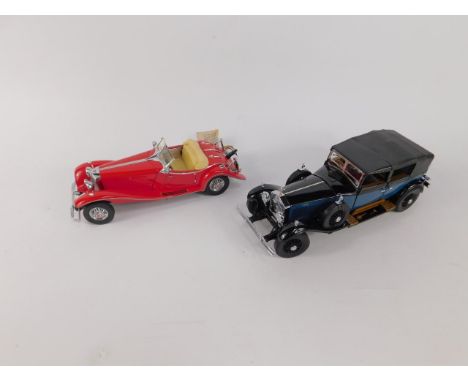 A Franklin Mint die cast model of a 1929 Rolls Royal Phantom I, scale 1:24, and another of a Mercedes 500K Special Edition, (