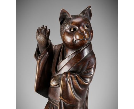 SHOKO SUGONOYA: A RARE AND FINE WOOD OKIMONO OF A CAT GEISHABy Shoko Sugonoya, signed ShokoJapan, Takayama, Hida province, la