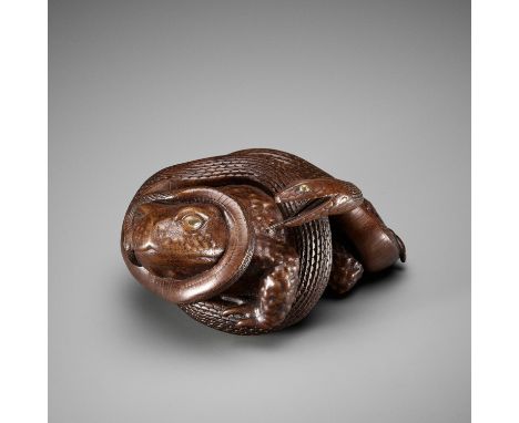 SUKENOBU: A MASTERFUL WOOD OKIMONO OF A TOAD AND SNAKEBy Sukenobu, signed Sukenobu (Ryosho)Japan, Takayama, Hida province, la