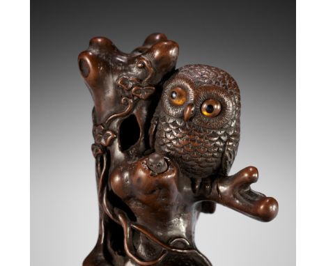 ITTOKUSAI: A BOXWOOD NETSUKE OKIMONO OF AN OWL WITH MOVABLE OWLETSBy Ittokusai, signed IttokusaiJapan, late 19th centuryFinel