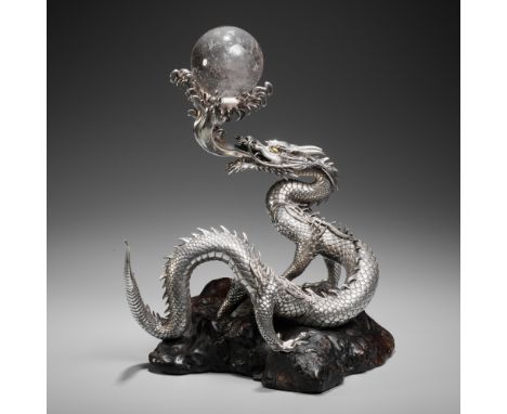 SANMI: A MASTERFUL SILVER OKIMONO OF A DRAGON WITH ROCK CRYSTAL SPHEREBy Gyokuryuken Sanmi (art name Kazumi), signed Kazumi w