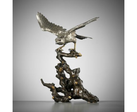HANEHIRO: A FINE SILVERED BRONZE OKIMONO OF A HAWKBy the Hanehiro workshop, signed Hanehiro Japan, late 19th century, Meiji p