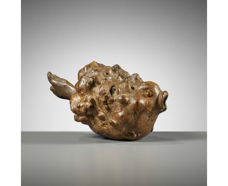 AN UNUSUAL ROOTWOOD FIGURE OF A FUGU (PUFFER) FISHJapan, Edo period (1615-1868)The burled and knotted rootwood of attractive 