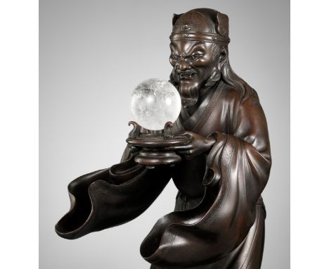 AN IMPRESSIVE BRONZE OKIMONO OF RYUJIN PRESENTING A ROCK CRYSTAL SACRED JEWEL (YASAKANI NO NAGATAMA)Japan, late 19th century,