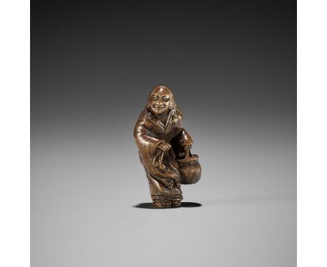 ENSAI: A VERY RARE WOOD NETSUKE OF TSURU SENNINBy Ensai, signed Ensai 宴齋Japan, 19th centuryFinely carved as the 'crane sennin