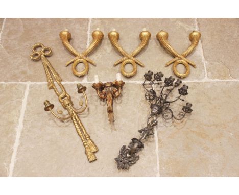 A trio of Empire style giltwood wall light fittings, 20th century, each formed as two interlinked fluted horn shaped branches