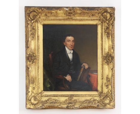 English school (19th century),A half length portrait of a seated gentleman holding a book,Oil on panel,Unsigned,34cm x 27.5cm