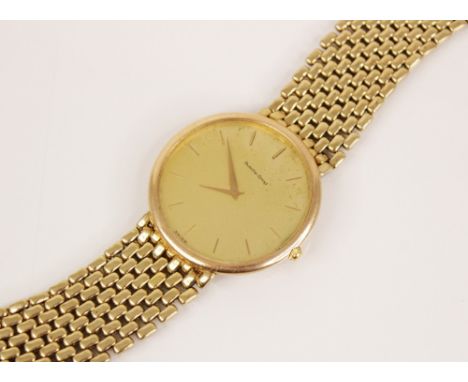A Gentleman's Bueche-Girod 9ct gold wristwatch, the gold toned dial with baton markers, set to a plain polished circular case