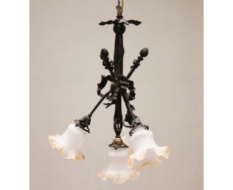 A French style four branch chandelier, early 20th century, modelled as three crossed arms "bound" to the central arm with a c